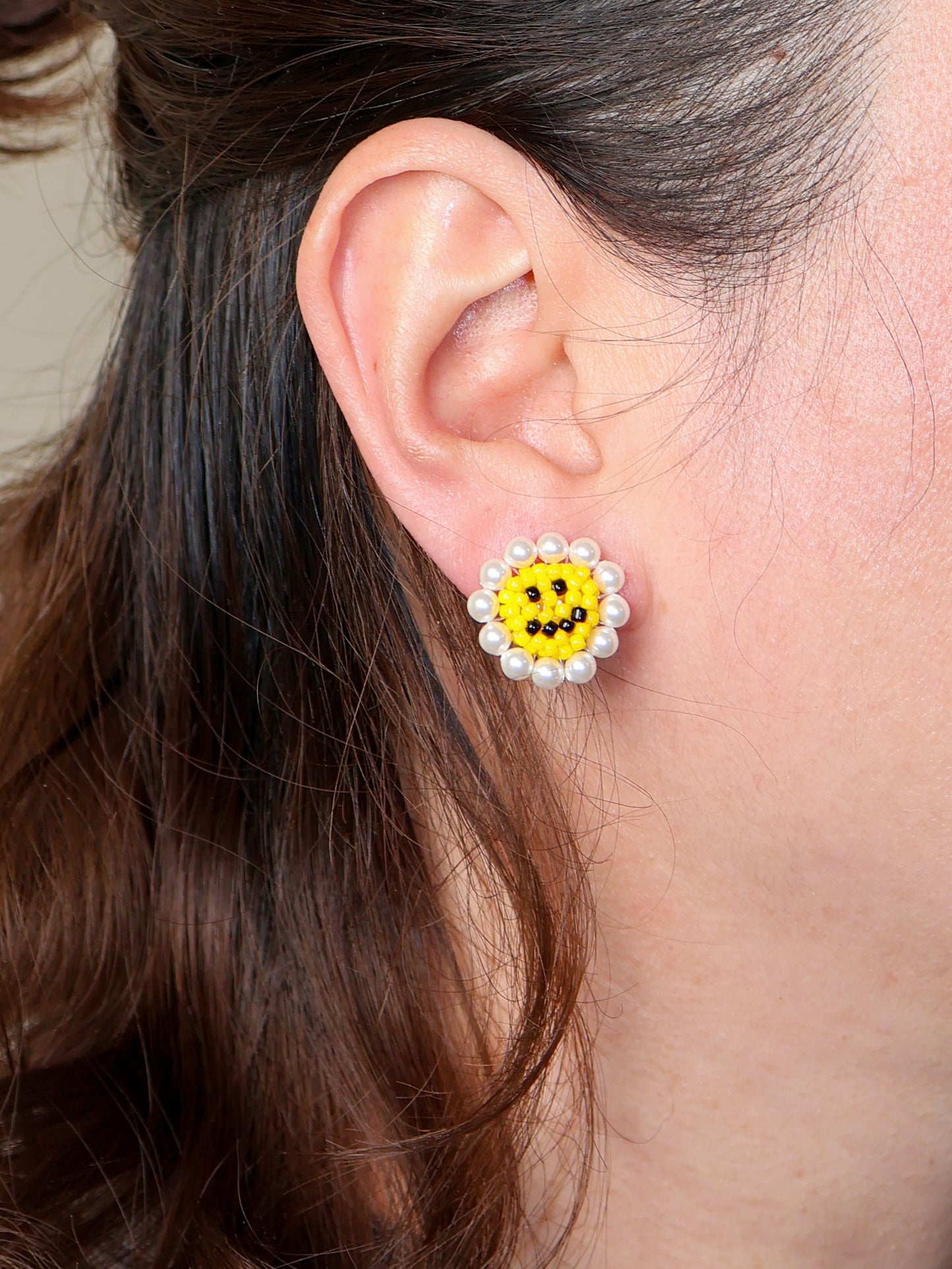 SNBC Smiley Daisy Ear Clips (a pair)
