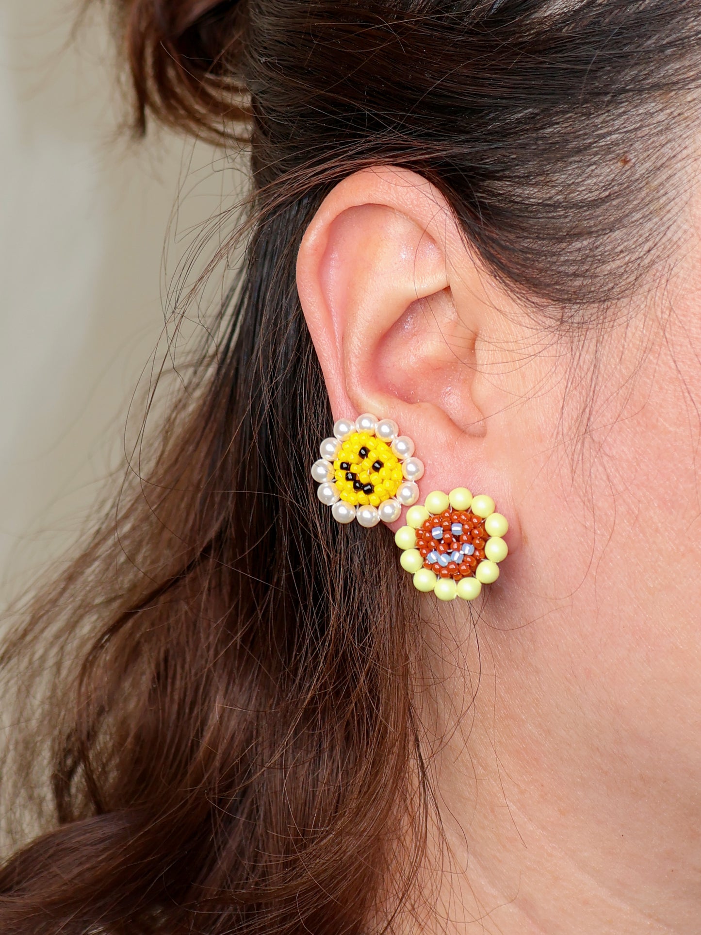 SNBC Smiley Daisy Ear Clips (a pair)