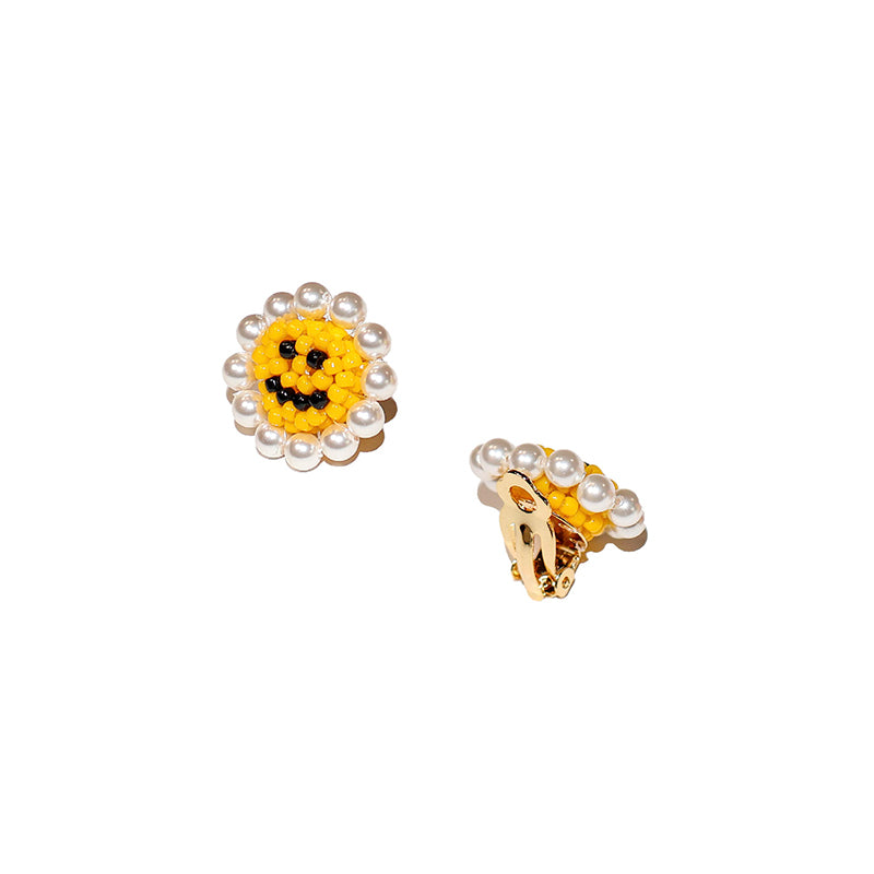 SNBC Smiley Daisy Ear Clips (a pair)