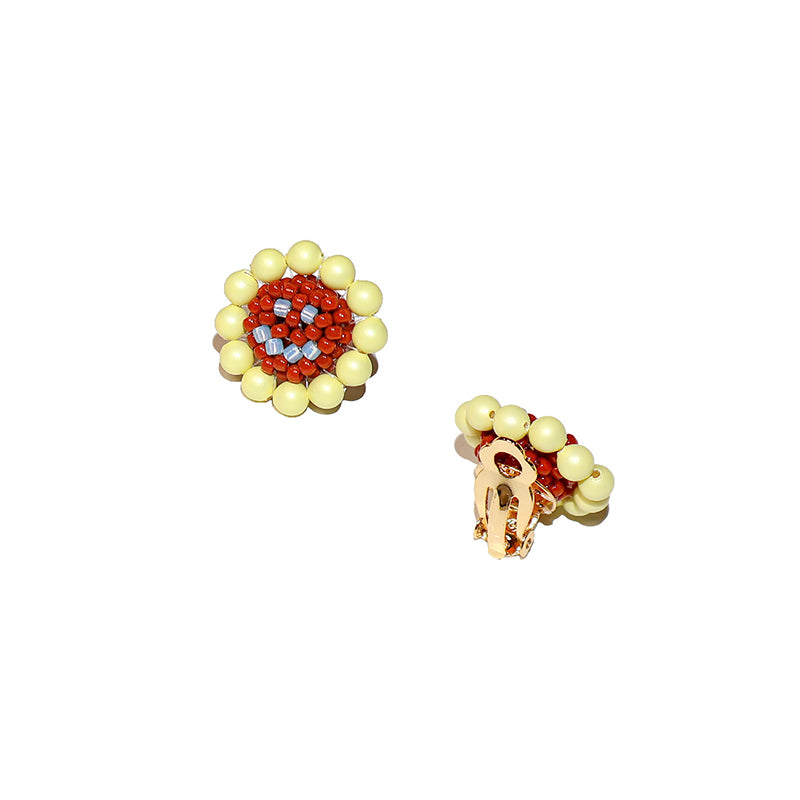 SNBC Smiley Daisy Ear Clips (a pair)